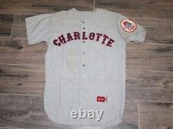 Maillot de baseball utilisé lors d'un match de ligue mineure des Charlotte Hornets de 1965, taille 42, marque Rawlings, rare.