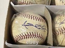 Un lot de douze balles de baseball Rawlings OMLB utilisées en match, signées sans certificat d'authenticité #1