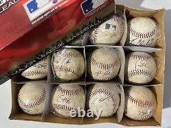Un lot de douze balles de baseball Rawlings OMLB utilisées en match, signées sans certificat d'authenticité #1